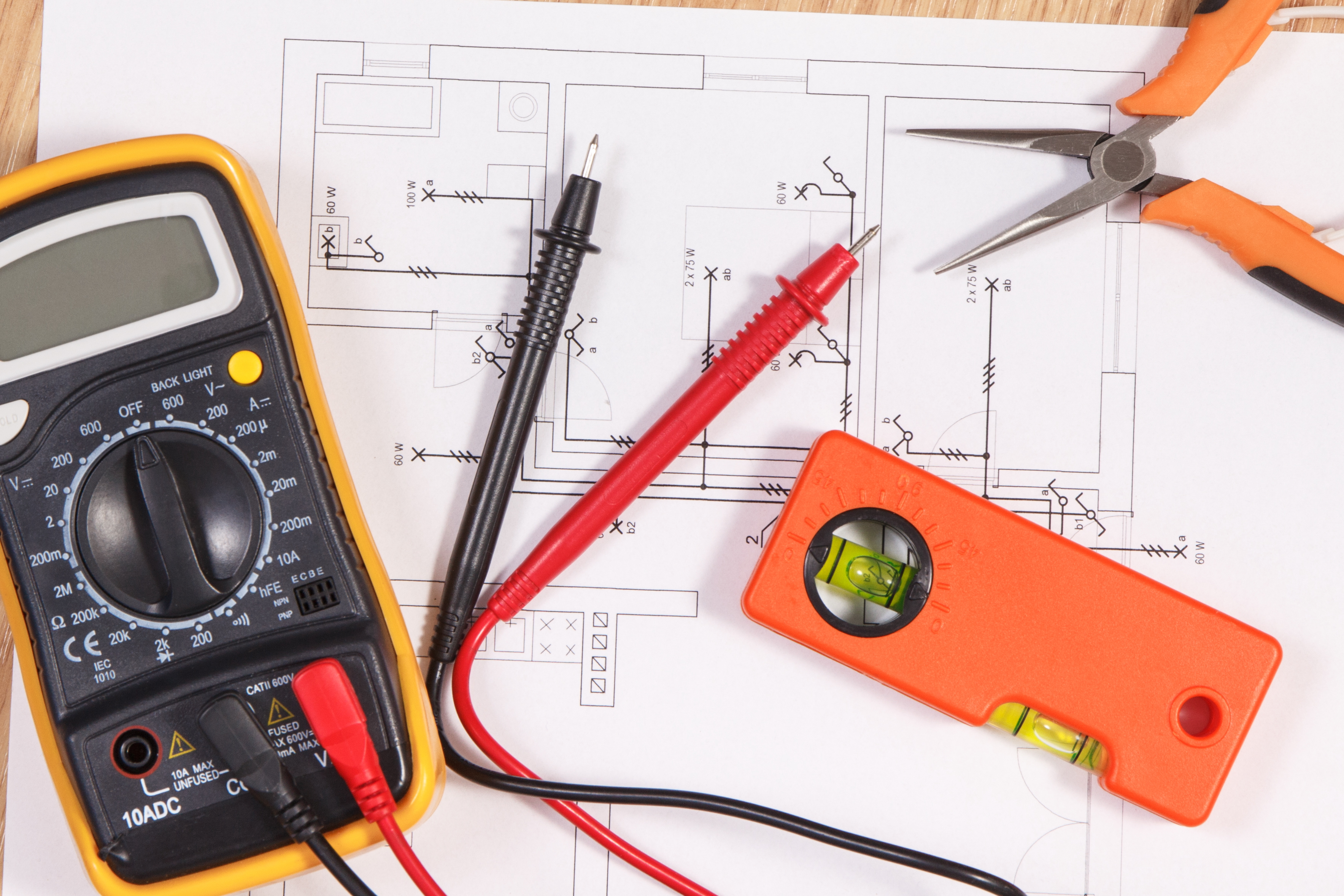 Electrical diagrams, multimeter for measurement in electrical installation and accessories for engineer jobs